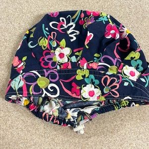 Scrub hat with adjustable elastic band